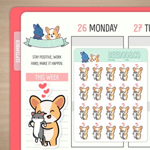 May include: A sheet of stickers featuring a cartoon corgi and cat hugging. The stickers are white with a pink border and hearts. The text "BEEDOO & CO." is at the top of the sheet. The text "STAY POSITIVE, WORK HARD, MAKE IT HAPPEN." is below the stickers. The text "THIS WEEK" is below the text.