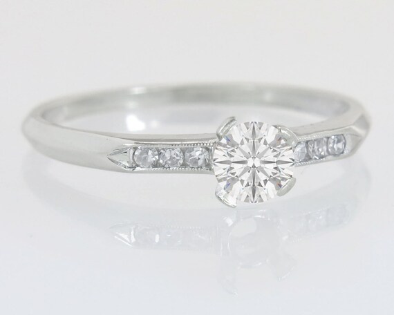 poinçon sur bague en or blanc poinçon sur bague en or blanc