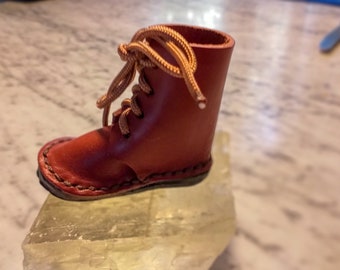 1 small hand-sewn leather boot made from high-quality vegetable hand-dyed leather from Tuscany