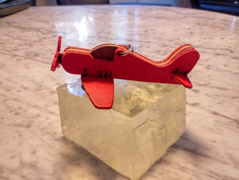 1 small hand-sewn airplane made of high-quality vegetable hand-dyed leather from Tuscany image 4