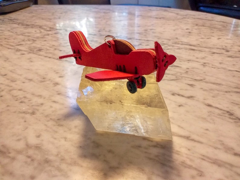 1 small hand-sewn airplane made of high-quality vegetable hand-dyed leather from Tuscany image 2