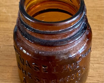 Vintage Vaseline Embossed Amber Glass Bottle