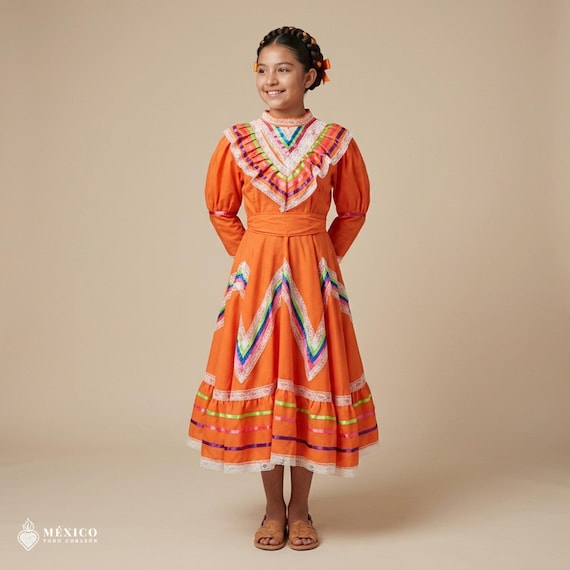 orange ethnic dress Introducing 'Molefe the rental dress', our stunning burnt orange bridal  gown! Make your wedding dreams come true with this breathtaking dress,  available for rental! Contact us to inquire about rental details and
