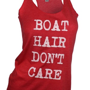 May include: Red tank top with white text that reads "BOAT HAIR DON'T CARE".