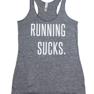 May include: Gray tank top with the text "RUNNING SUCKS." printed in white.