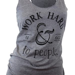 May include: Gray tank top with a black graphic that says "Work hard & be nice to people."