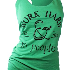 May include: Green tank top with a black graphic that says "Work Hard & Be Nice To People".