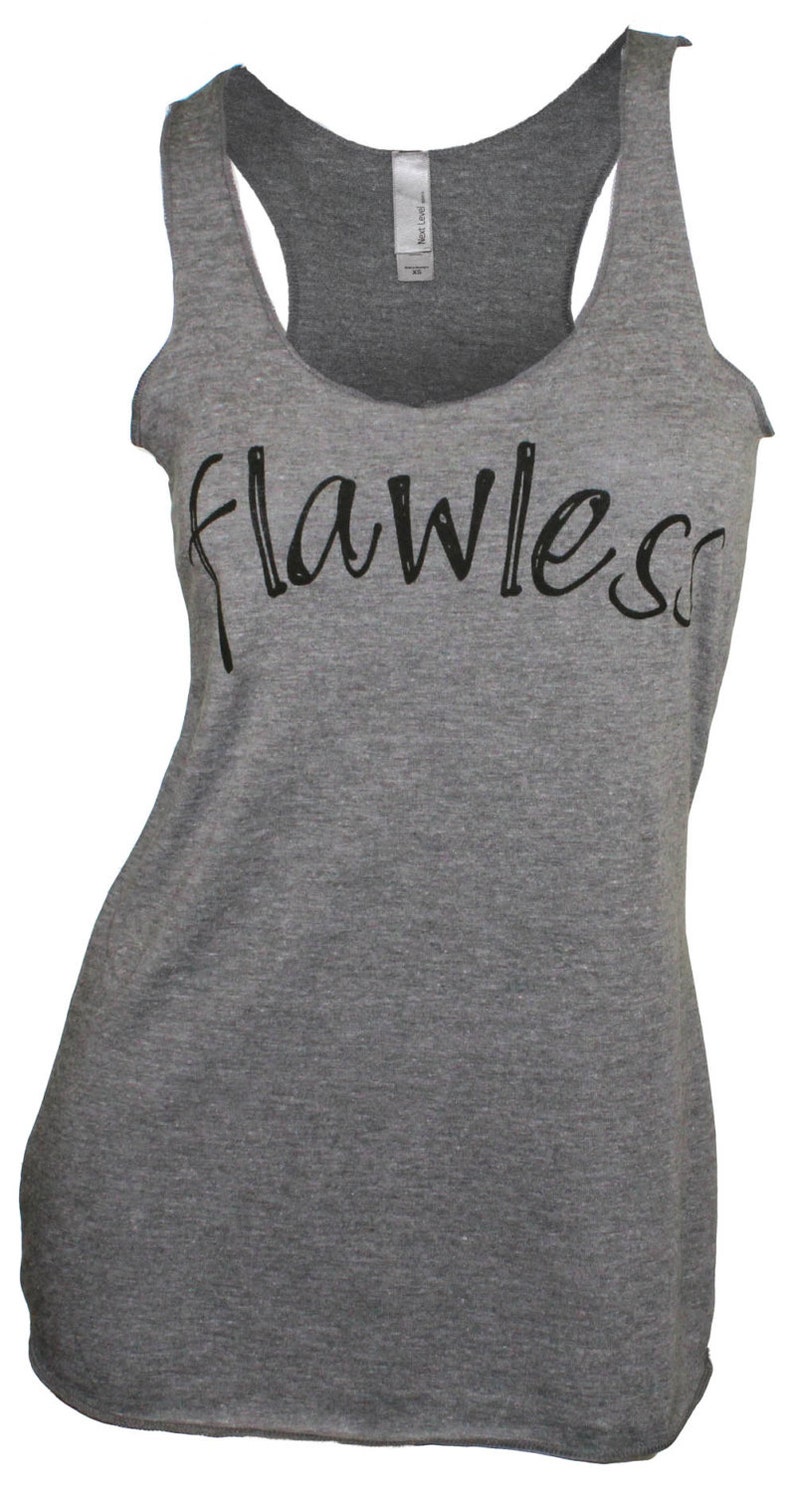 May include: Gray sleeveless tank top with the word "flawless" written in black cursive lettering.