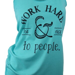 May include: A turquoise tank top with a black graphic that says "Work Hard & Be Nice To People."