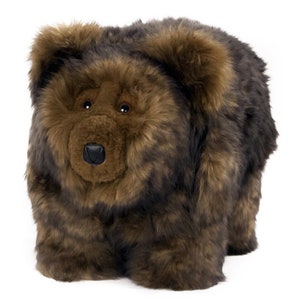 Grizzly Bear Footstool - Symbol of the wilderness  This bear waits to be tamed. You may adopt this bear from Wooly  Rascals - Made in USA