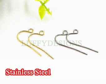 May include: Two pairs of earring hooks made of stainless steel. One pair is gold and the other is silver.