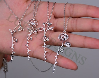 May include: Four silver necklaces with delicate flower and name designs. Each necklace features a different flower and the name "Samantha" written in a cursive script.