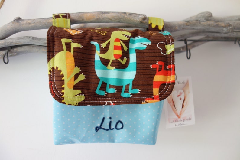 Lenkertasche mit Klappe Dinosaurier mit Wunschname hellblau Bild 1