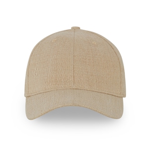 Puede incluir: Una gorra de béisbol beige con tejido texturizado.