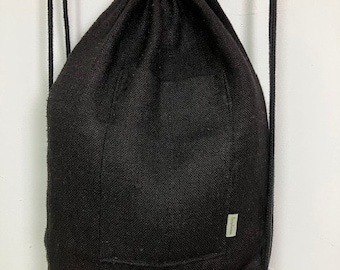 Ruck sack | Hand made from 100% Hemp | Eco dyed black hemp | Canvas weave | 48cm high x 34cm wide | Internal and external pockets |