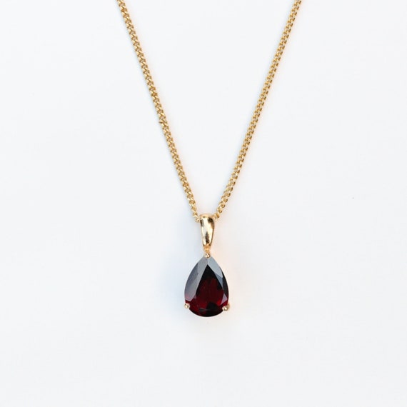 9ct Yell Gold 10x7mm Garnet Teardrop 