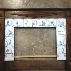 Old oak fireplace frame with 15cm x 15cm delft majolica
