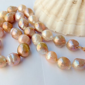 Real pearl.12 – 14mm, 48cm Edison pondslime Kasumi like nucleated freshwater pearl strand.  #72