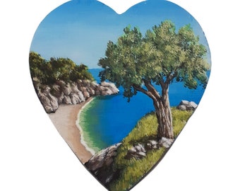 Olive tree on the hill over a sandy beach, landscape painting with acrylics on flat wooden heart. Original art ornament nature landscape.