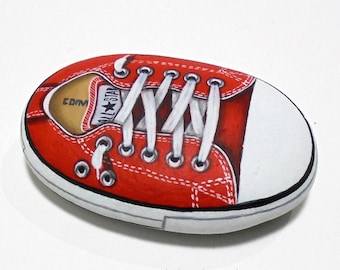 Red Sneaker Shoe Painted On A Small Stone! Is Painted with high quality Acrylics  and finished with Satin varnish protection.