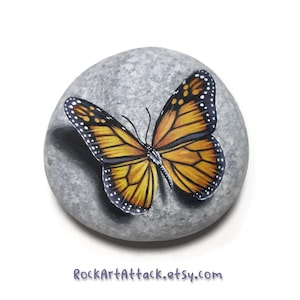 Monarch butterfly original acrylic painting on natural sea stone. Hand painted pebble orange butterfly. Handmade stone painting for home decoration. Butterfly art.