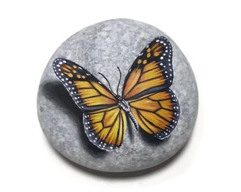 Stone painting art monarch butterfly! Painted on natural flat sea stone with acrylics and finished with satin varnish. Butterfly home decor
