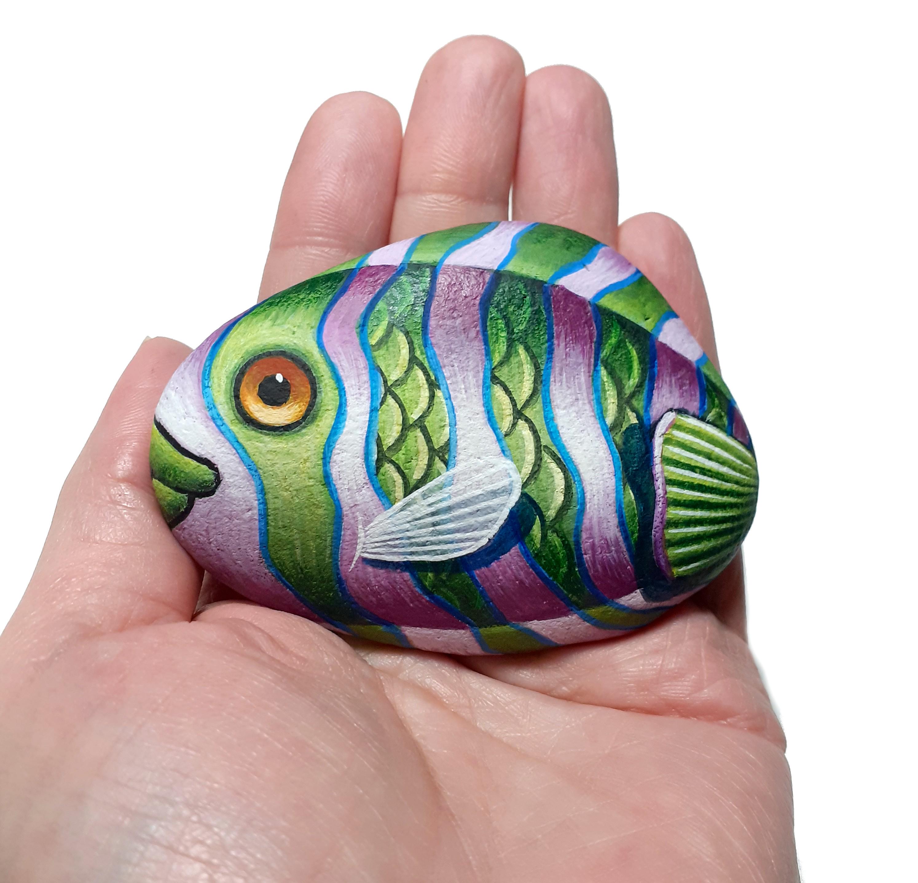 Green fish with red violate stripes hand painted stone. Rock painting art with acrylics and finished with satin varnish. fish table decor.