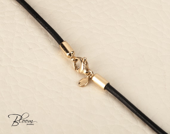 Thin black leather cord necklace for man with silver nugget