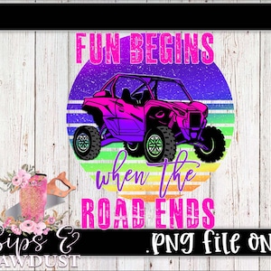 May include: A graphic design featuring a pink and purple off-road vehicle with the text "FUN BEGINS when the ROAD ENDS" in a retro style. The design is set against a colorful sunset background, with the words "PNG file ONLY" at the bottom.