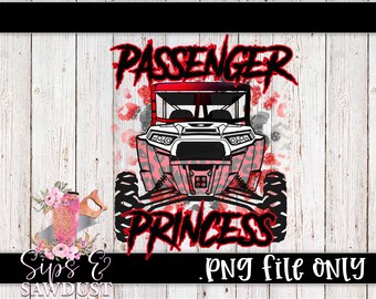 May include: A digital design featuring a red and black off-road vehicle with the words "PASSENGER PRINCESS" in a bold, stylized font. The design includes a floral arrangement and the text "Sips & Sawdust .PNG file ONLY" on a white wood background.