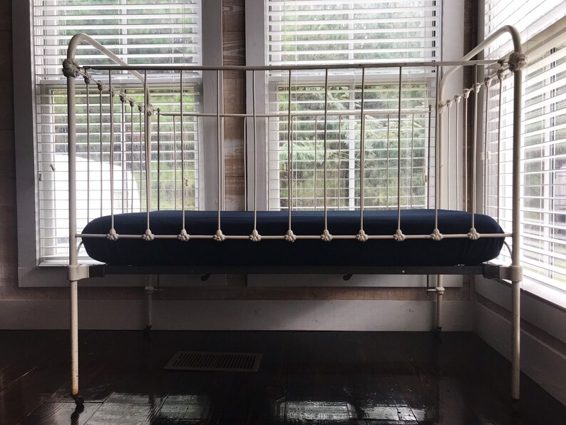 dark blue crib sheet