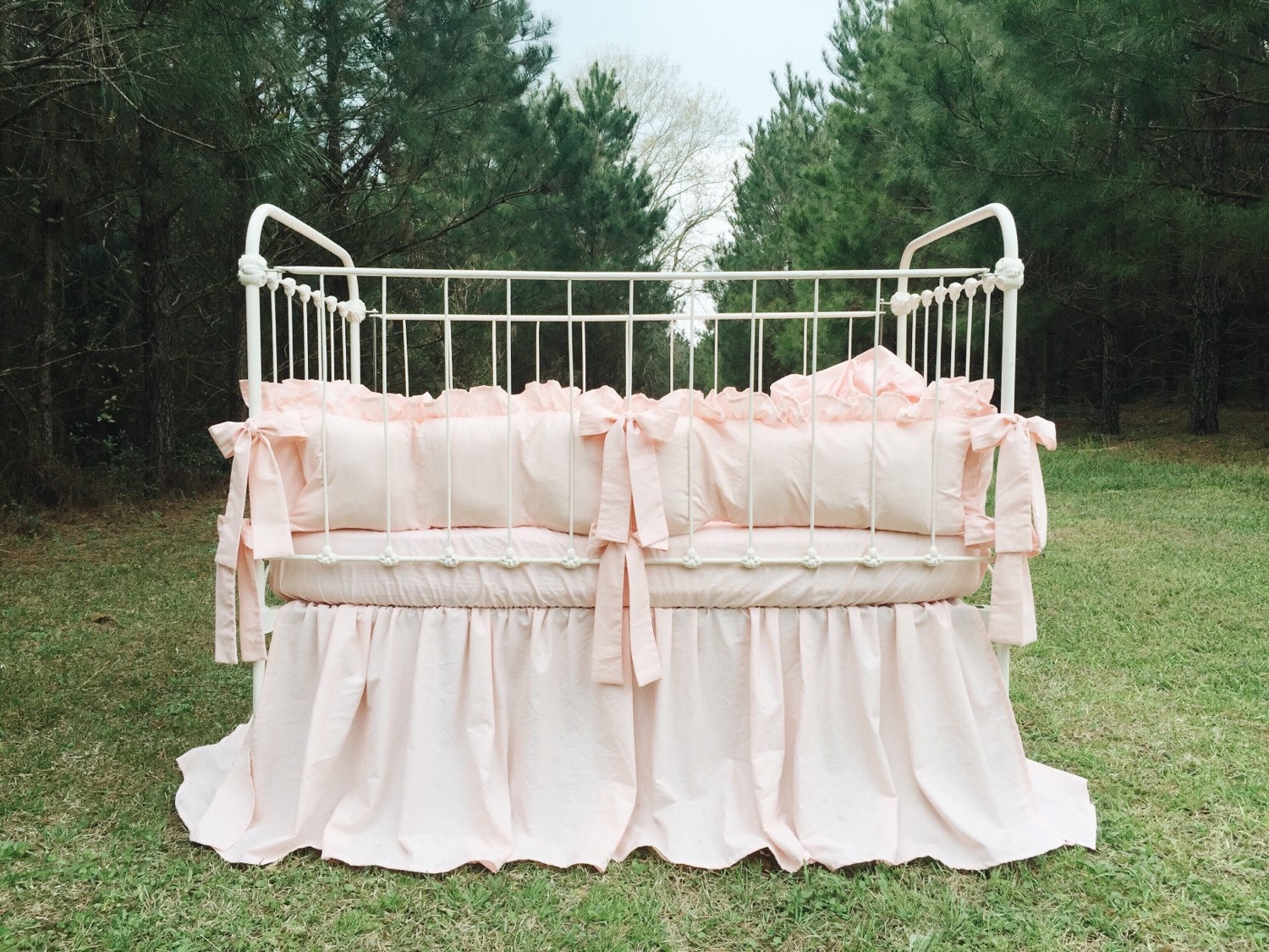 frilly cot bedding