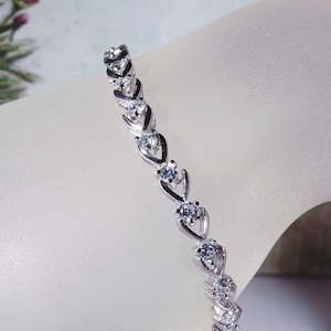 Vintage Crystal Heart Tennis Bracelet: Silver Rhodium Plated Austrian Crystals