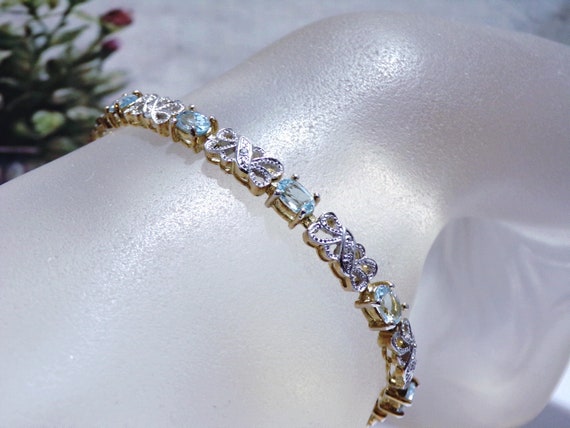 Blue topaz and diamond tennis deals bracelet