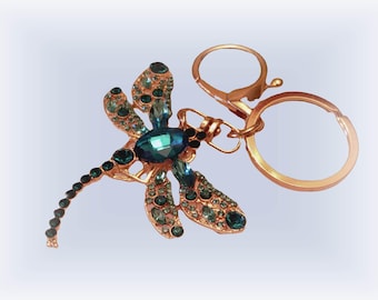 Sleutelhanger met blauwe libel en handtasbedel met strassteentjes - verguld messing (NOS)