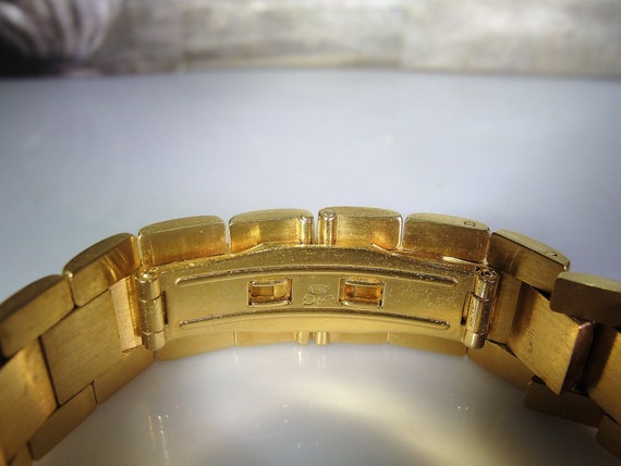 festina 18k gold watch