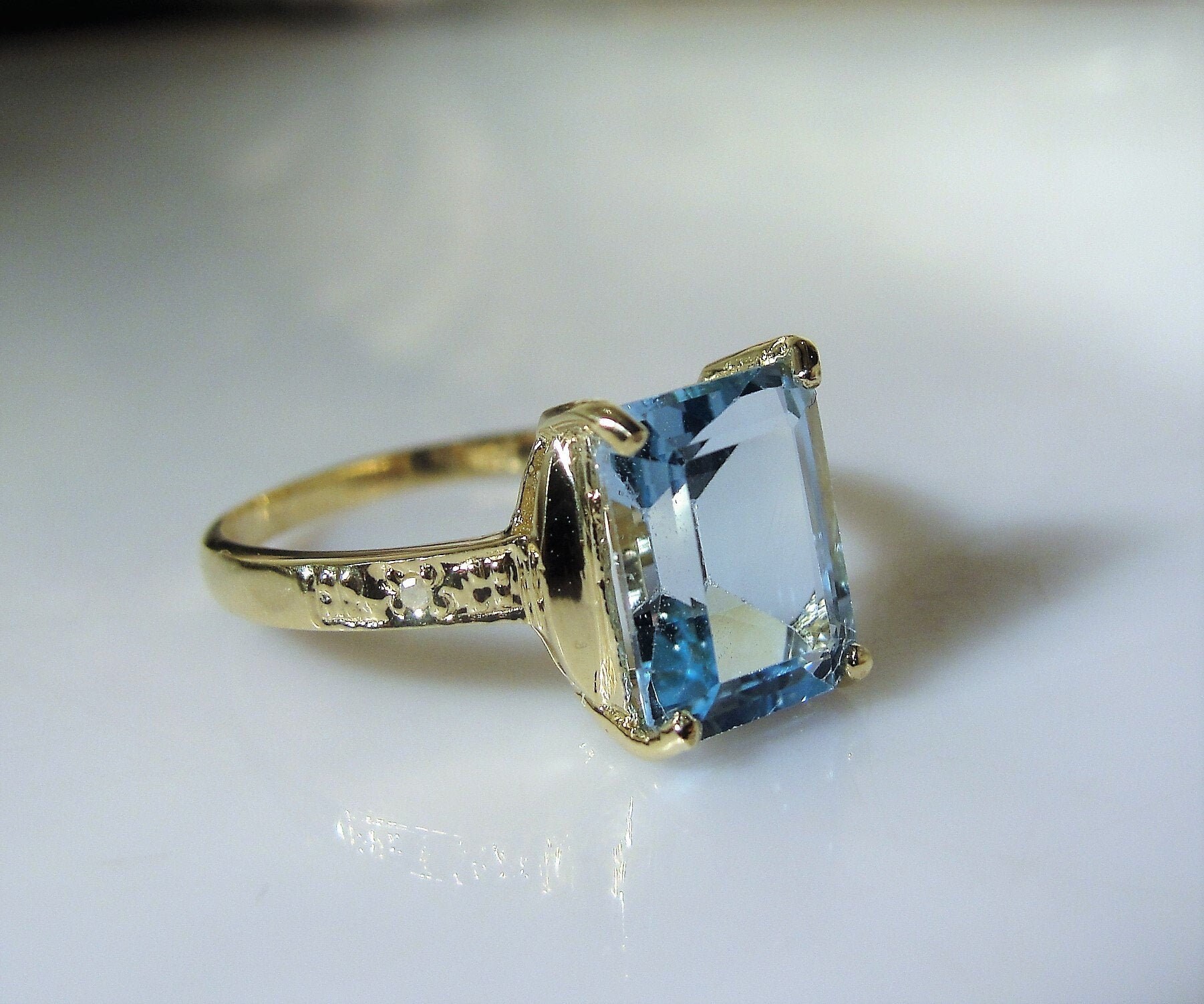 10K Swiss Blue Topaz and Diamond Ring, 2.2 Carat Emerald Cut Blue Topaz