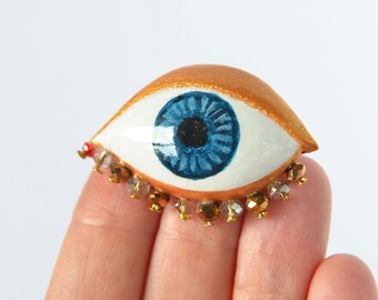 Handmade Evil Eye Brooch – Blue Eye Pin with Gold Accents & Crystal, 45mm x 30 mm
