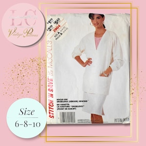 May include: Vintage McCall's sewing pattern featuring a woman wearing a white skirt suit. The pattern includes sizes 6-8-10. The text on the pattern reads "Stitch 'N Save" and "Focus on Overlock (Serger) Sewing".