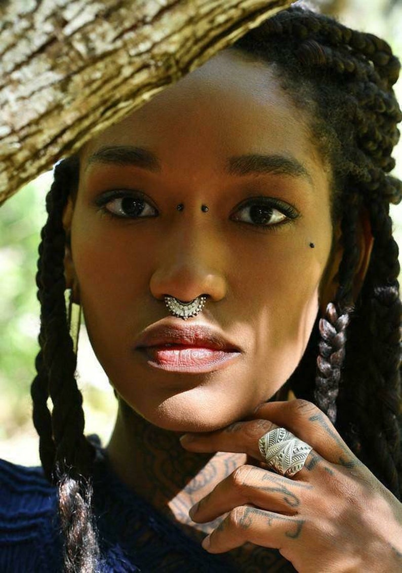 ancient septum jewelry on model