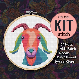 May include: Cross stitch kit featuring a colorful goat design. The kit includes a 6-inch hoop, Aida fabric, needle, DMC thread, and a symbol chart.
