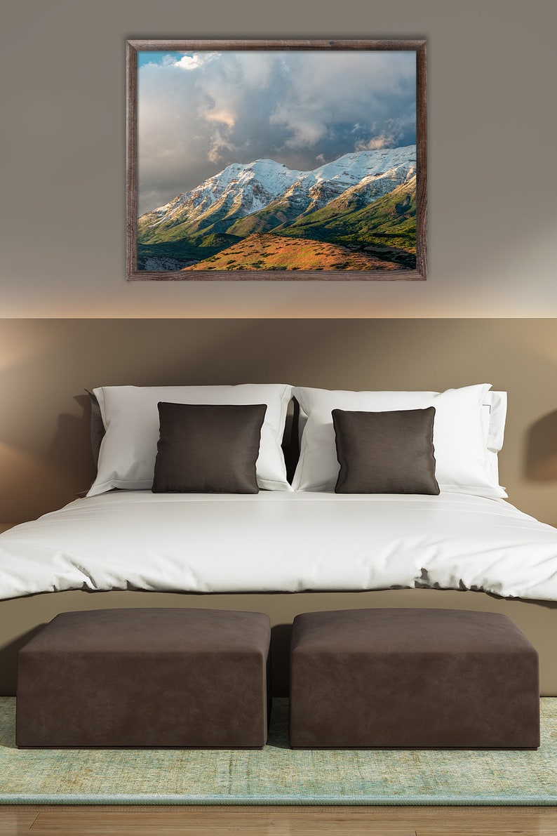Bedroom wall art featuring a framed print of Mount Timpanogos.
