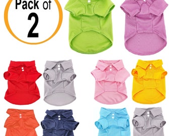 May include: Pack of 2 dog polo shirts in various colors, including red, green, purple, gray, pink, yellow, orange, blue, and light blue. The shirts have a classic polo style with a button-up collar and short sleeves.