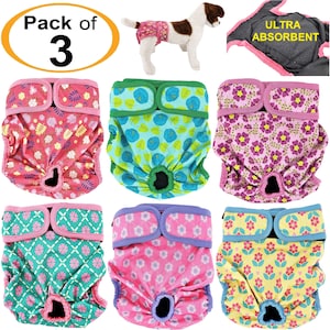 May include: Pack of 3 reusable dog diapers with different floral patterns. The diapers have a black elastic waistband and a black hole for the tail. The diapers are made of a soft, absorbent material. The image also shows a small dog wearing one of the diapers.