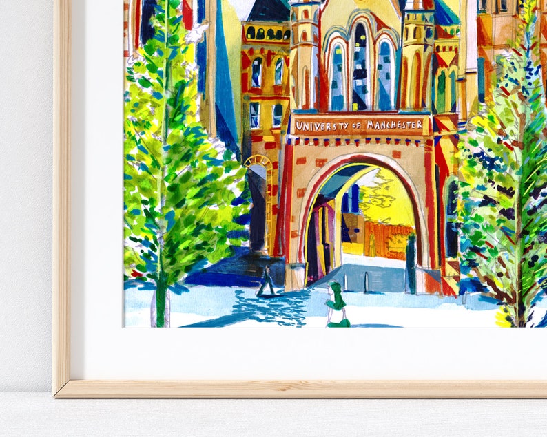 May include: A watercolor painting of a university building with a large archway and the text "University of Manchester" above it. The building is painted in bright colors, including red, yellow, and blue. There are two trees on either side of the archway, and a person walking through the archway.