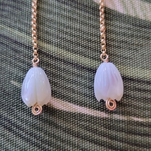Earrings with a single mother of pearl pikake bead and gold-filled chain.  Gold-filled chain and a single Hawaiian jasmine bead.
