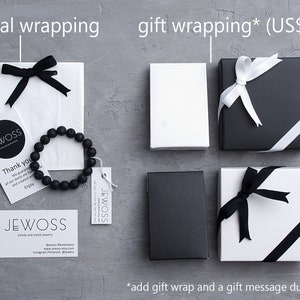 May include: An overhead shot showcases jewelry packaging options. A black lava bead bracelet is displayed with a tag and a thank you note. Gift wrapping options include black and white boxes with ribbons. The brand name "JEWOSS" is visible.