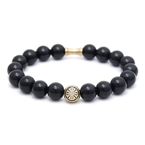 Pulsera de ónix con flor de Buda, con energía de buena suerte y protección. Joya budista con significado para mujer / 10 mm