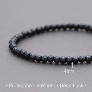 May include: Black beaded bracelet with 4 mm beads. Protection, Strength, Good Luck.