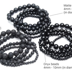 May include: Three sets of black beads, each with different textures. The first set is smooth and matte, the second is rough and textured, and the third is smooth and shiny. Each set is labeled with the type of bead and the size range in millimeters.